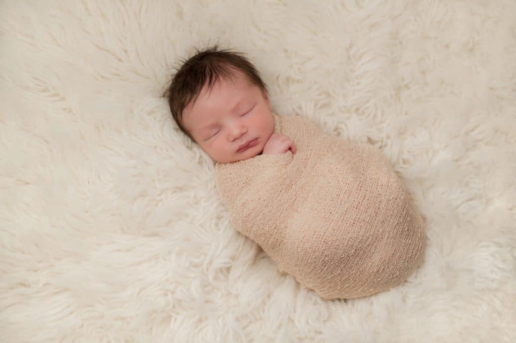 Portrait of a Bundled Up Newborn Baby Boy