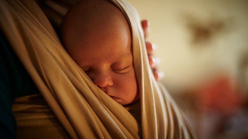 baby on momma asleep