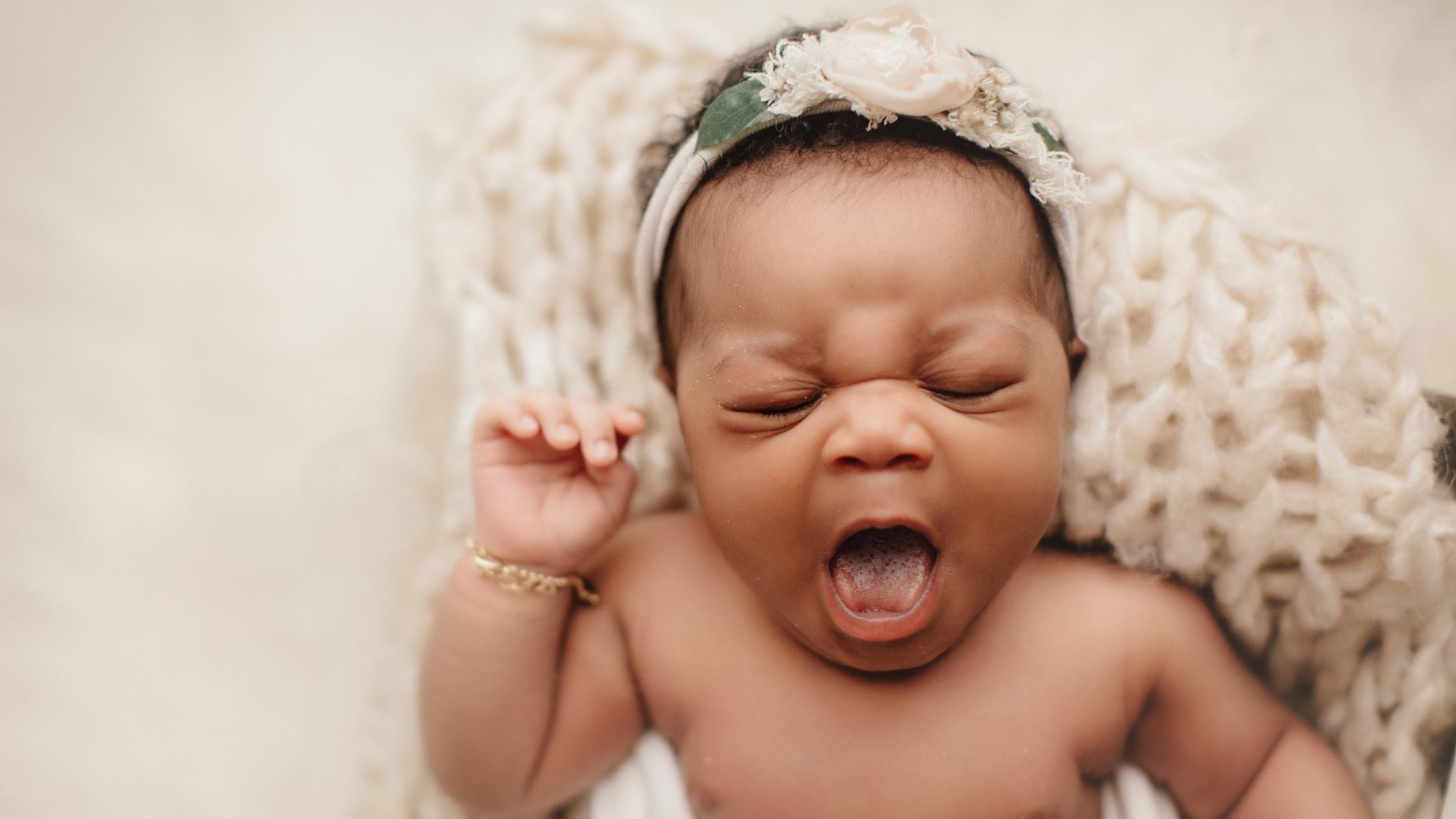 baby newborn in crib