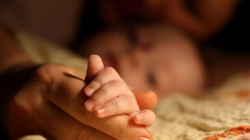 mom and baby sleeping