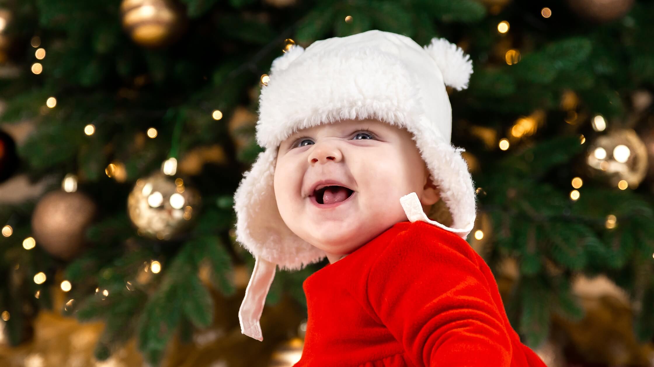 cute smiling baby dressed for christmas holiday