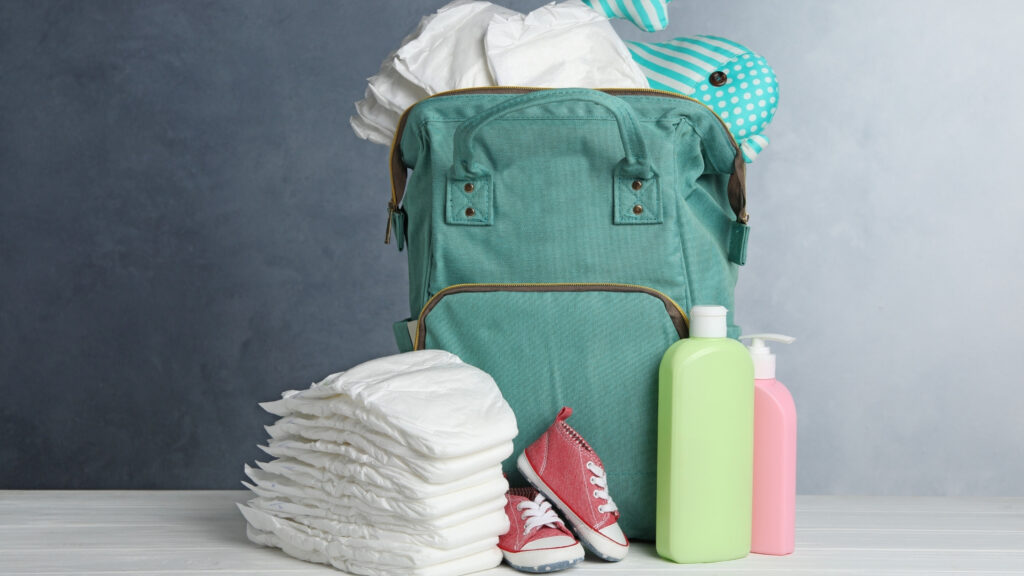 diaper bag with diapers in front