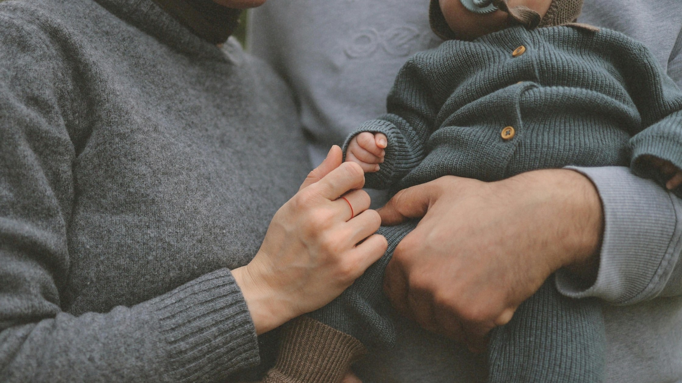 mother holding baby