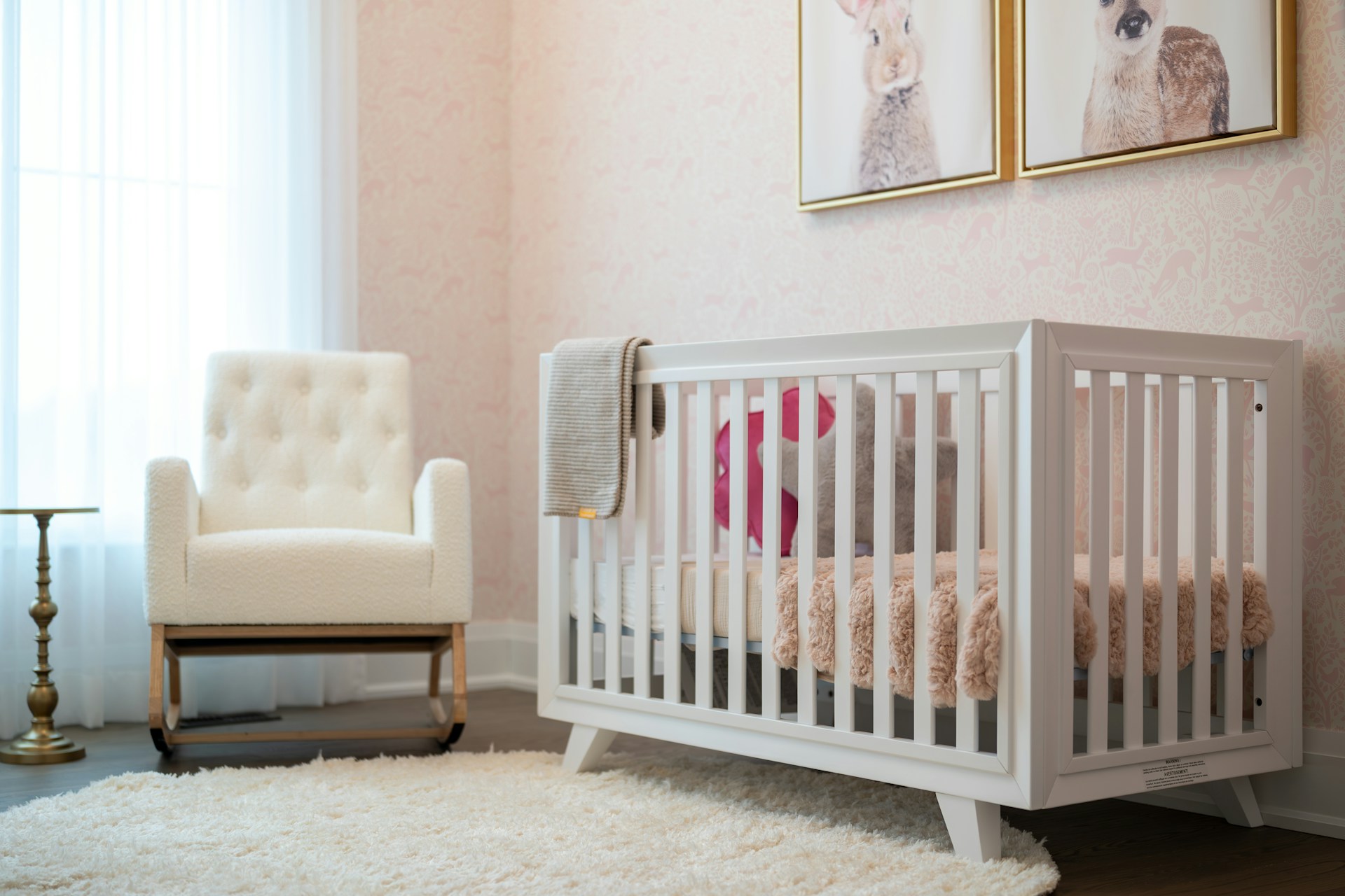 crib and chair in baby's room
