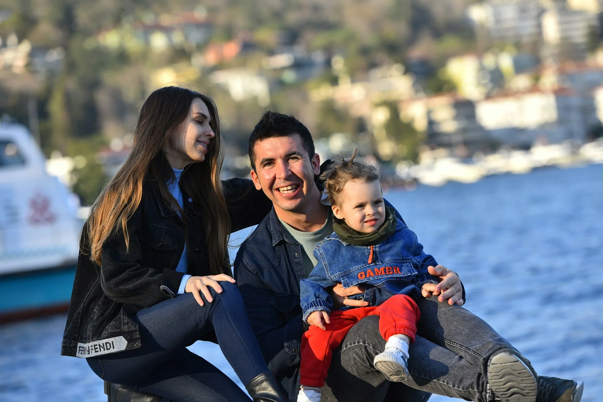 family with toddler at lake